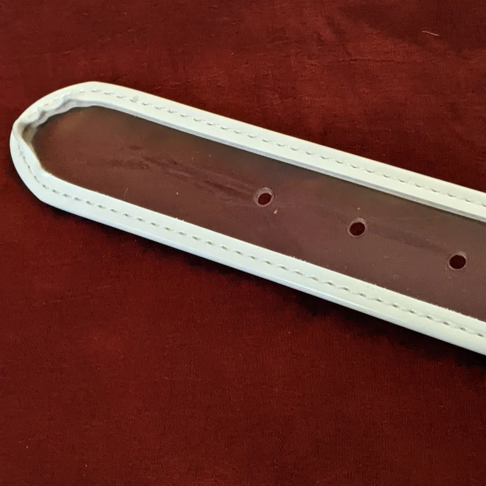 Set Of Two Clear and White Belts One With Tag Brandy Melville 36